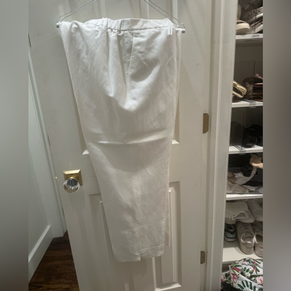 White polished cotton dress trousers.
